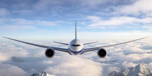 Airplane flying in blue skies